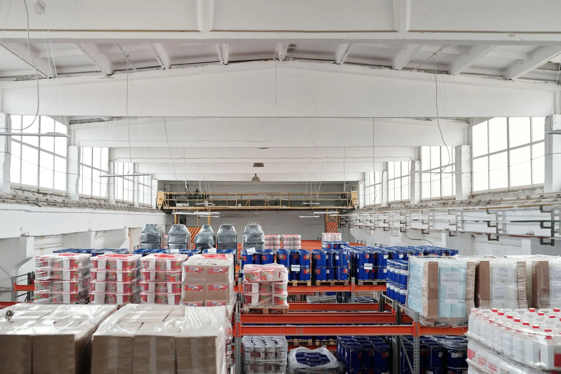 Furniture manufacturing warehouse preparing boxed products for export shipping