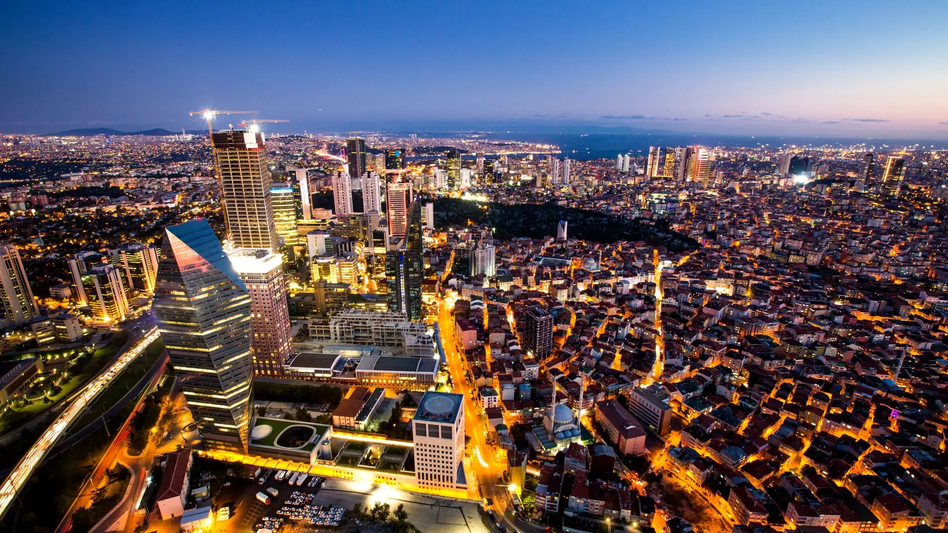 Modern commercial real estate buildings representing real estate investment in Turkey.