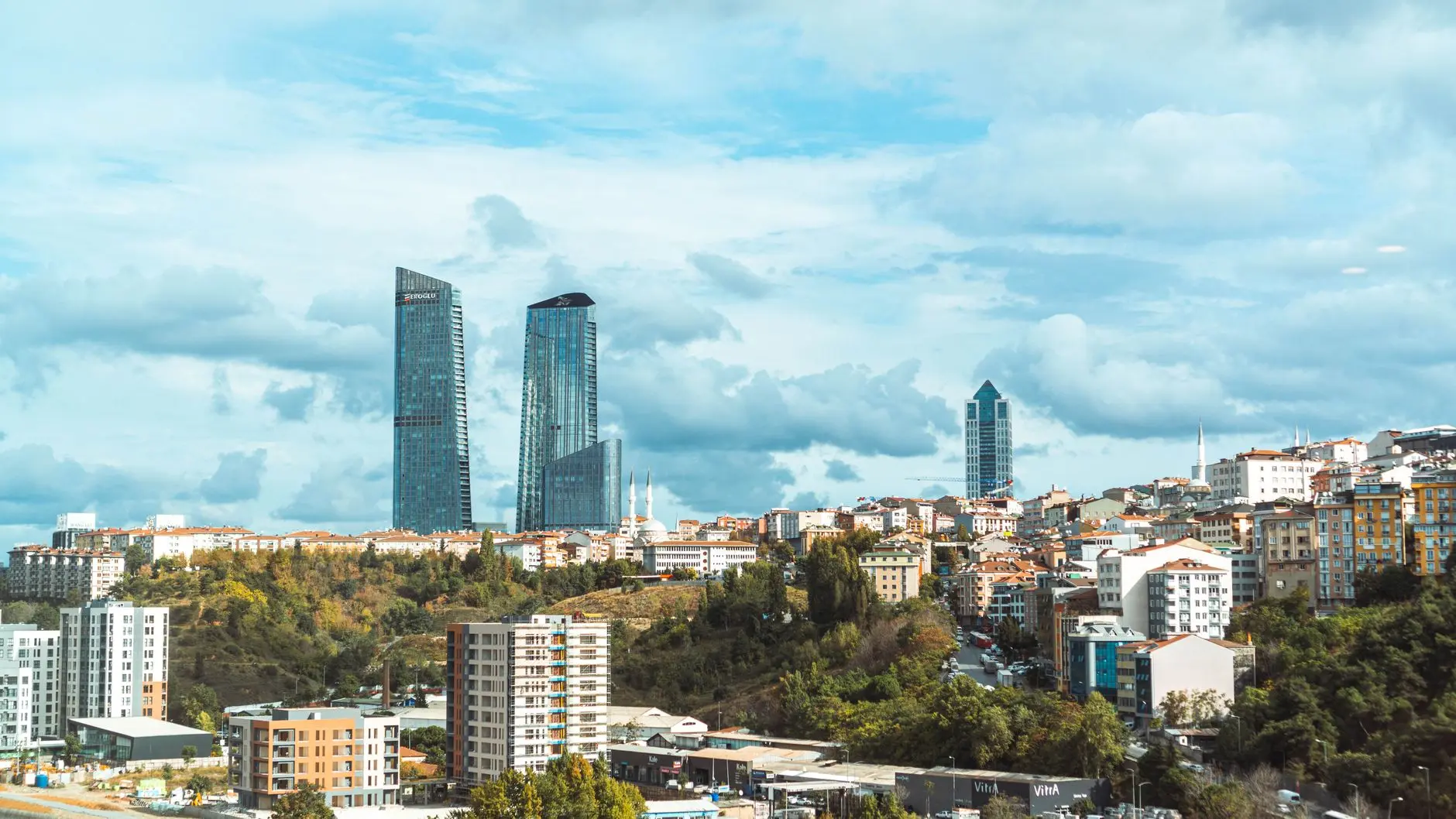 Modern architectural developments and real estate buildings representing the Turkish real estate market landscape.